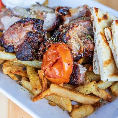 Grilled pork over fries