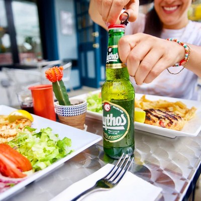 Mythos beer with grilled chicken and salad
