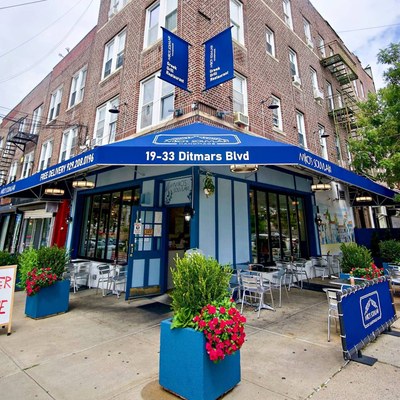 Niko's Souvlaki storefront with its blue awning on Ditmars Boulevard in Astoria
