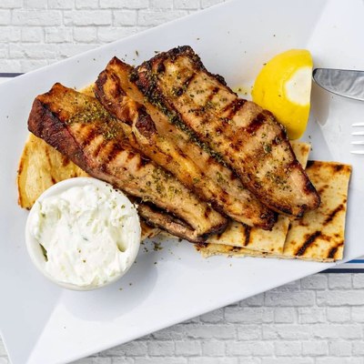 Grilled pork over pita